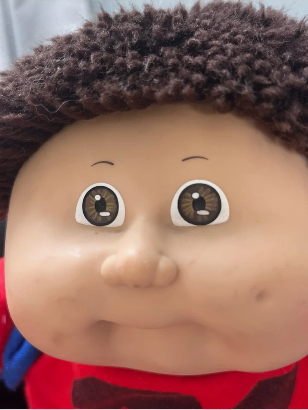 Cabbage Patch Kid with short clipped hair in sweats outfit